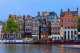 canals explore Amsterdam